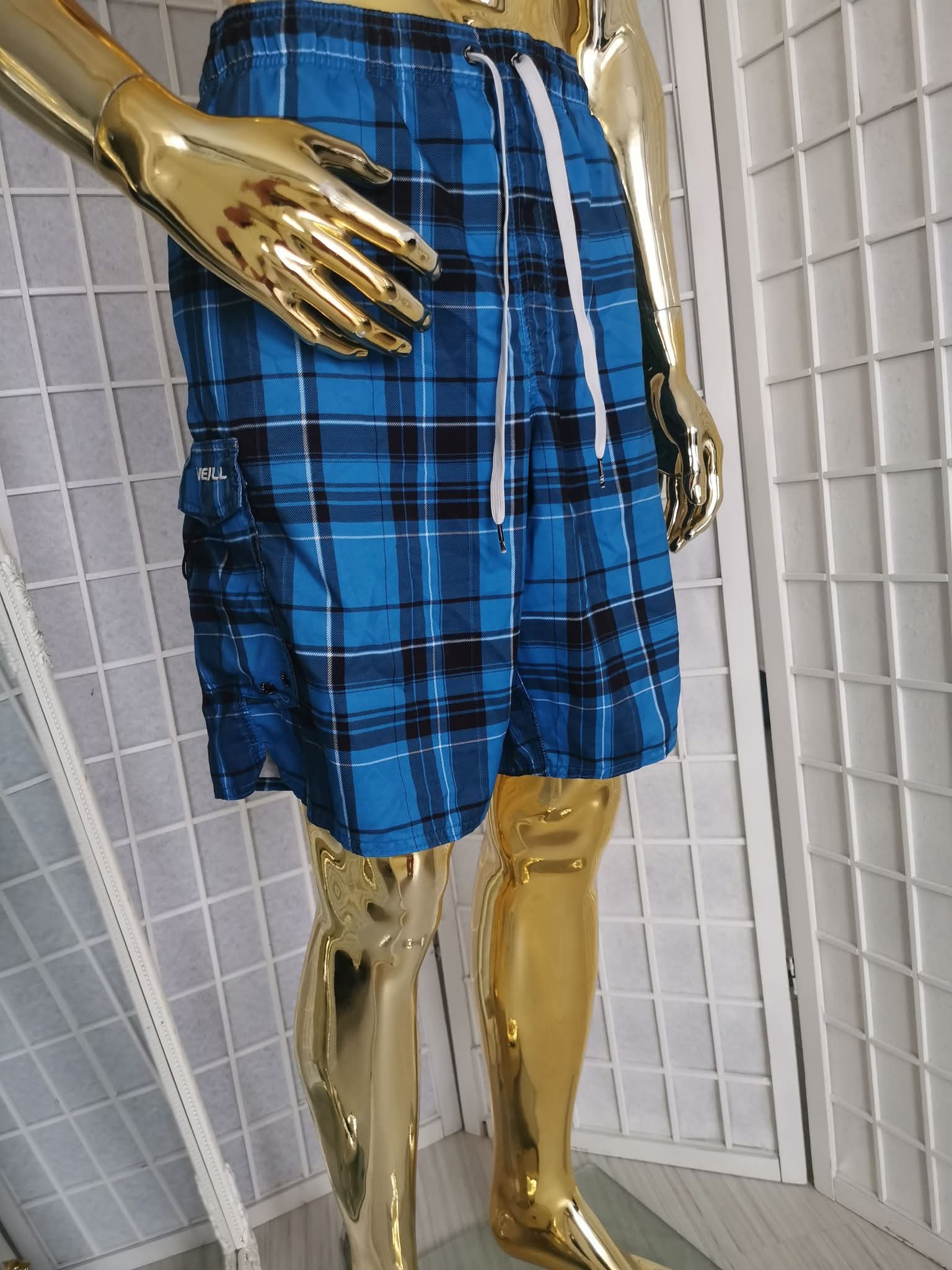Mėlyni languoti šortai